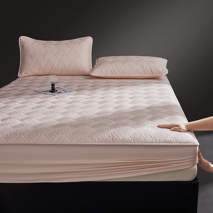 Quilted mattress topper as fitted cover with non-slip underside