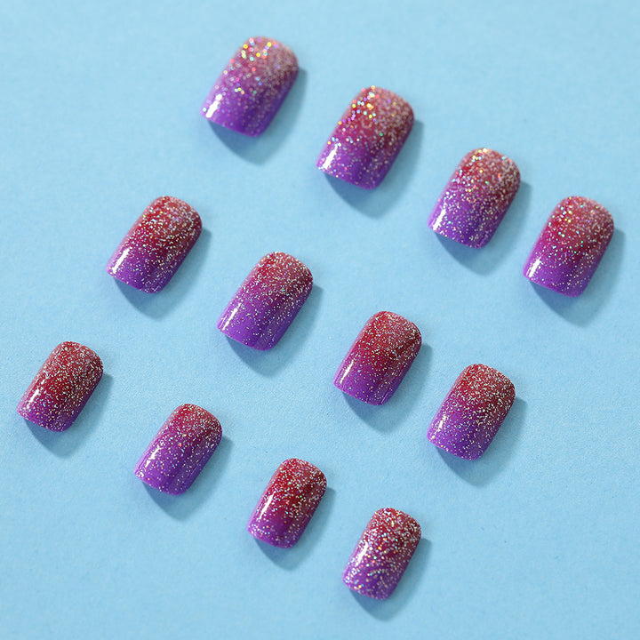 Glittering artificial nails with gradient Stornfield