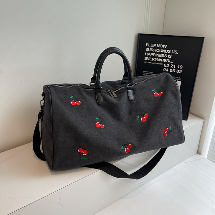 Sporty weekend bag with playful cherry pattern Stornfield