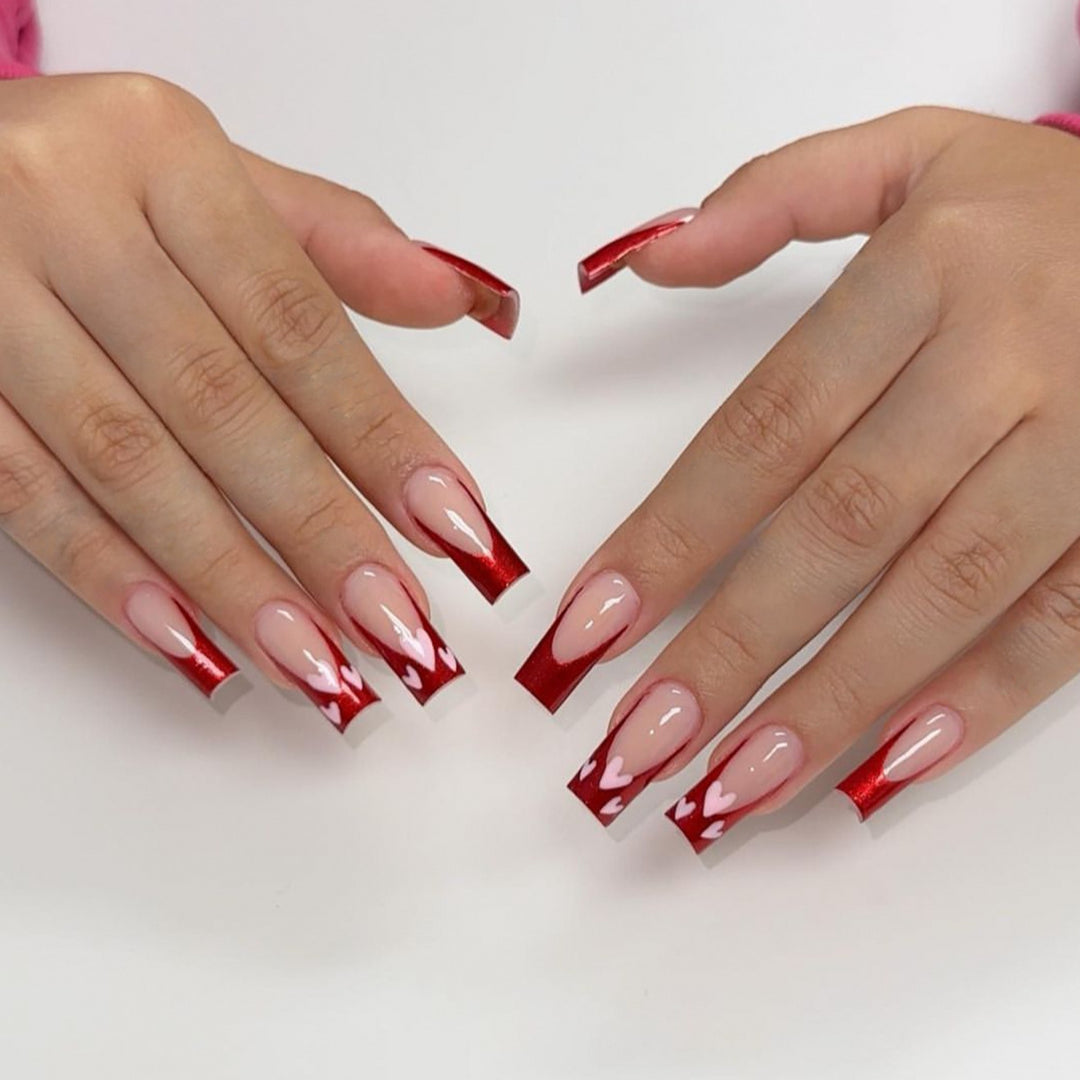 Heart-Patterned Acrylic Nail Art Extensions Stornfield