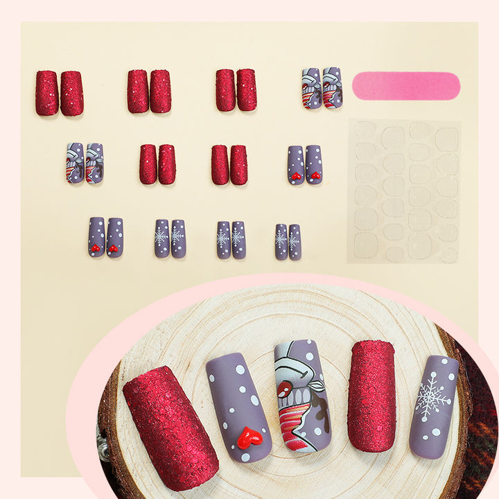 artful nail set with festive glitter and Christmas motifs Stornfield
