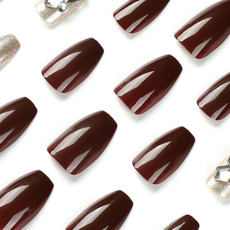 Artfully designed Gel nails with rhinestone decorations Stornfield