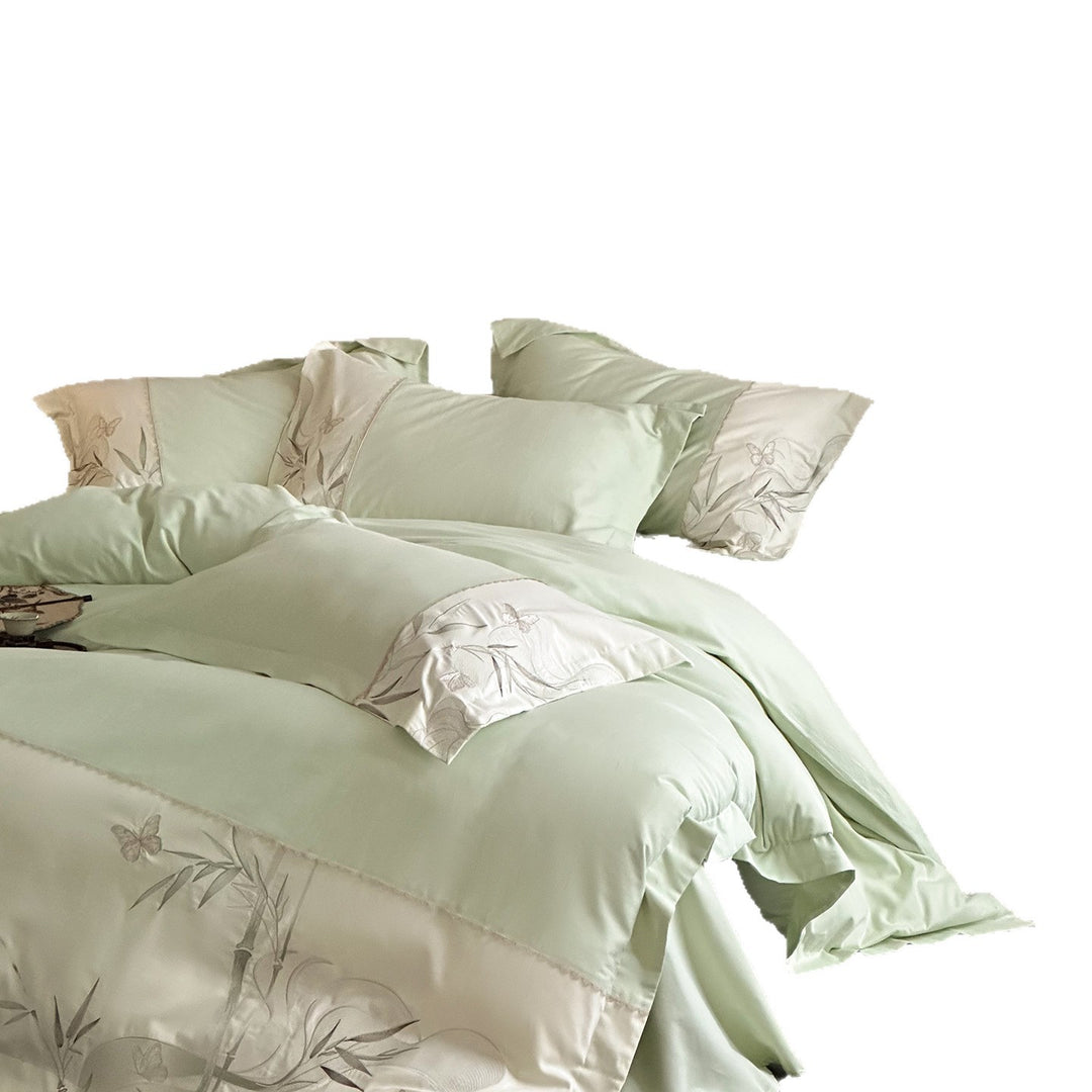 Elegant cotton satin bedding set with embroidered bamboo and butterfly border