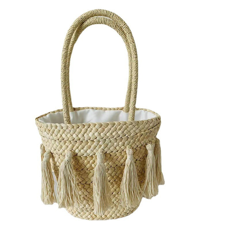 Trendy basket bag with tassels Stornfield