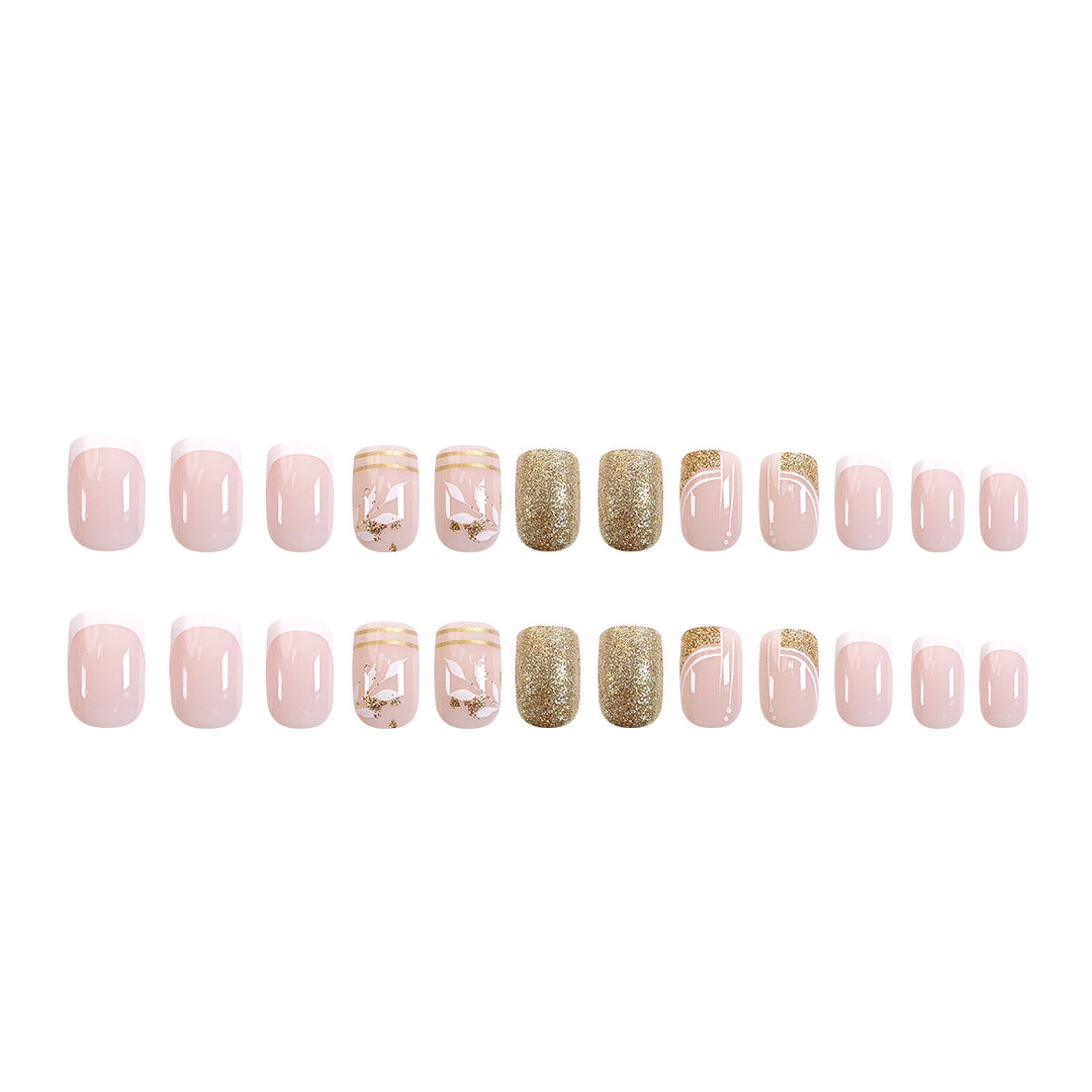 Elegant and creative artificial nails with gold accents Stornfield