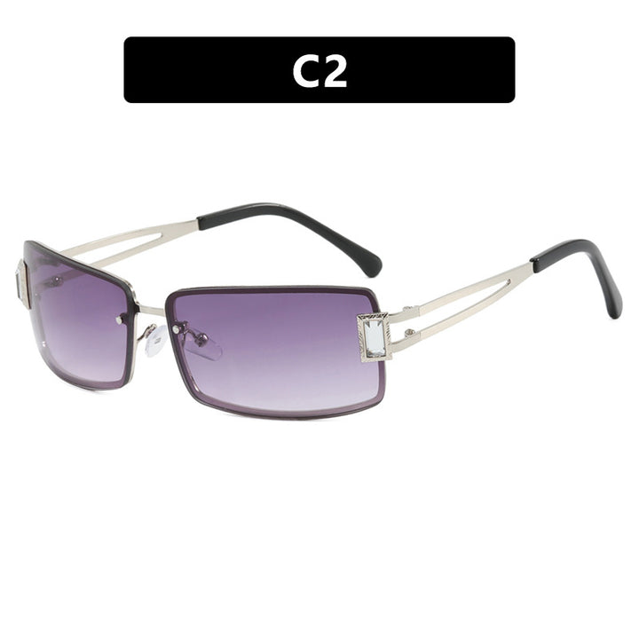 Ladies stylish sunglasses with elegant trapezoidal lenses and filigree metal frame Stornfield