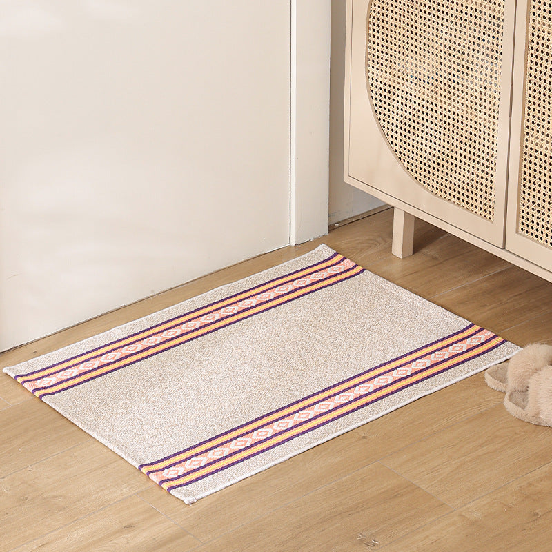 Flat striped carpet runner made of cotton blend with anti-slip coating and easy-care woven structure