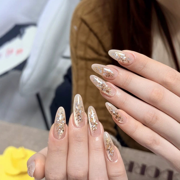 Elegant Stiletto Nail Extensions with Glitter Accents