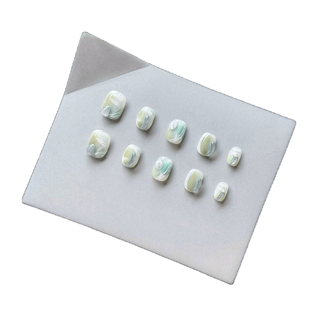 Artistic Press-On Nail Set with Glossy Marble Design