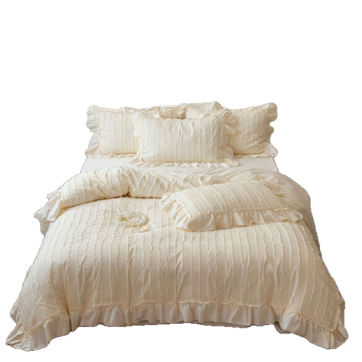 Romantic bedding set with ruffle and textured quilted look
