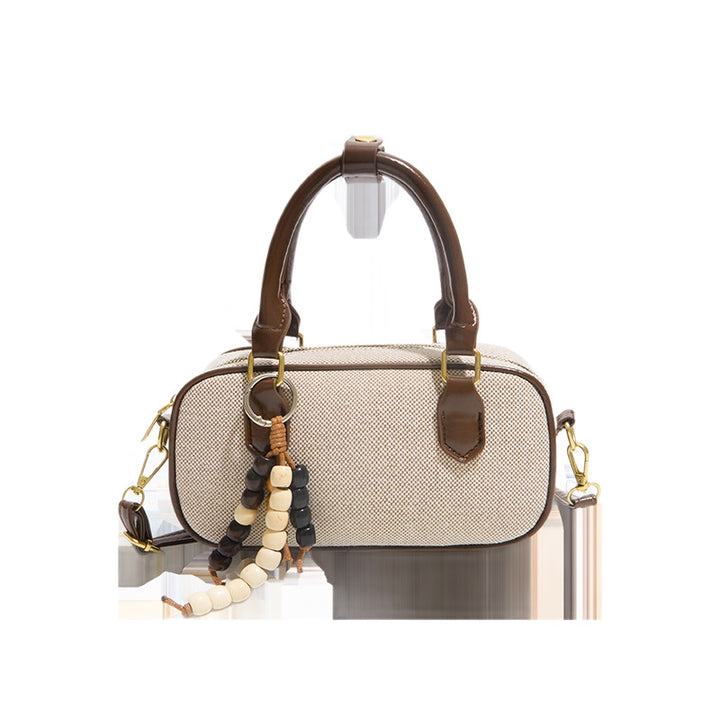 Vintage-Inspired Glossy Handheld Satchel