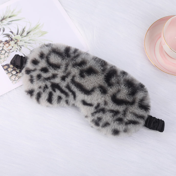 Women's luxury faux fur sleep mask with leopard print, extra soft padding and elastic comfort band Stornfield