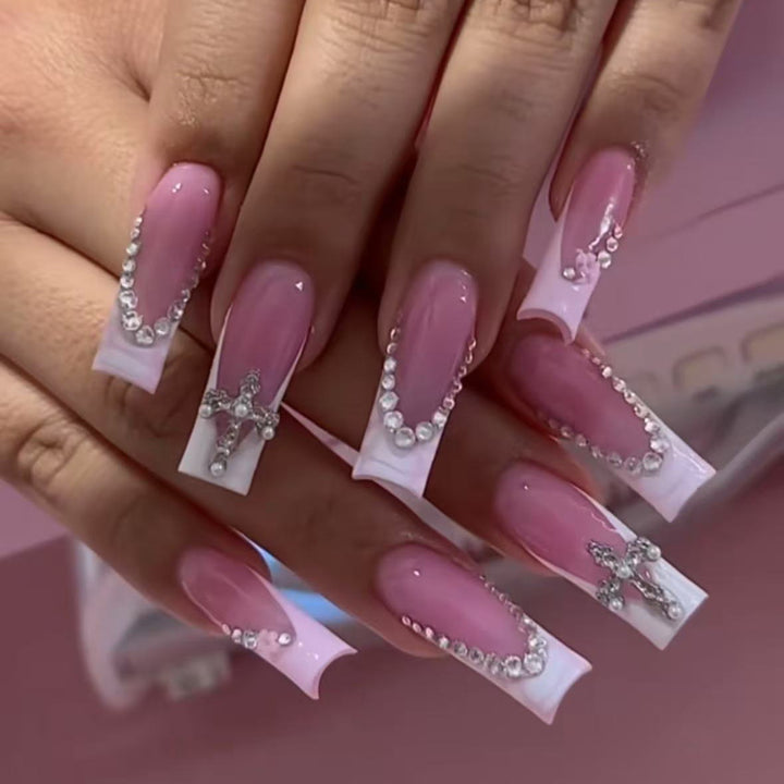 Acrylic nail set with glamorous rhinestone decorations and elegant French tips Stornfield