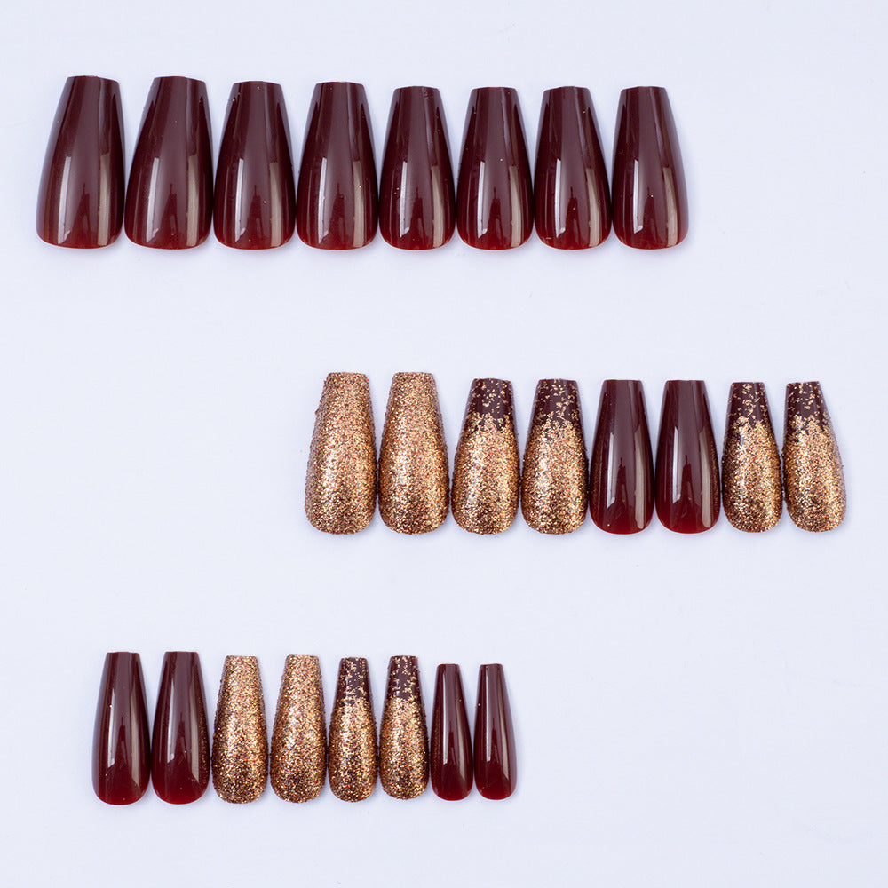 Glamorous artificial nails with glitter and elegant embellishments Stornfield