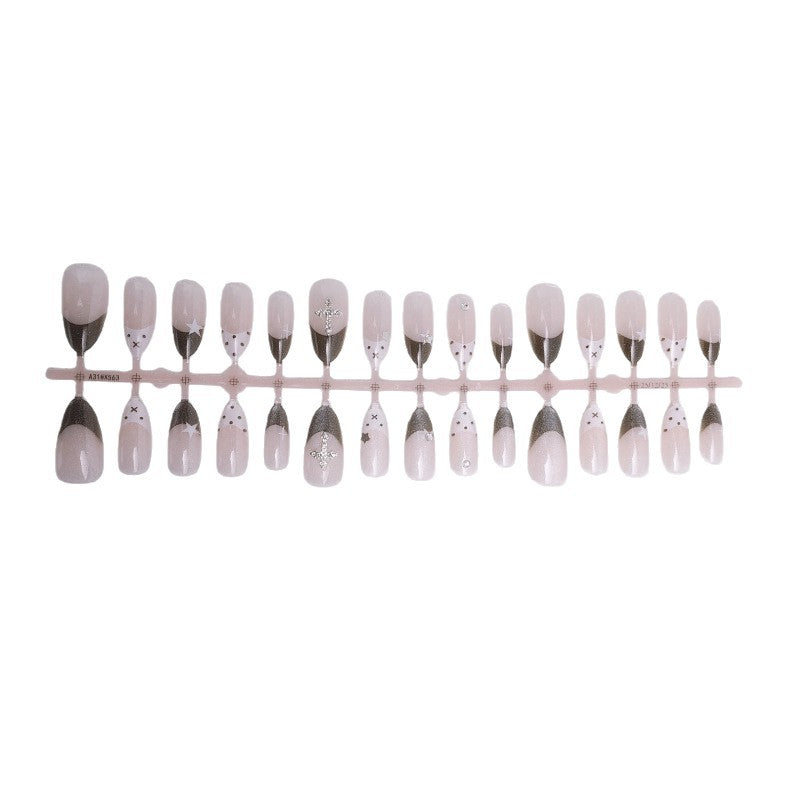 Glittering artificial nail design with elegant accents Stornfield