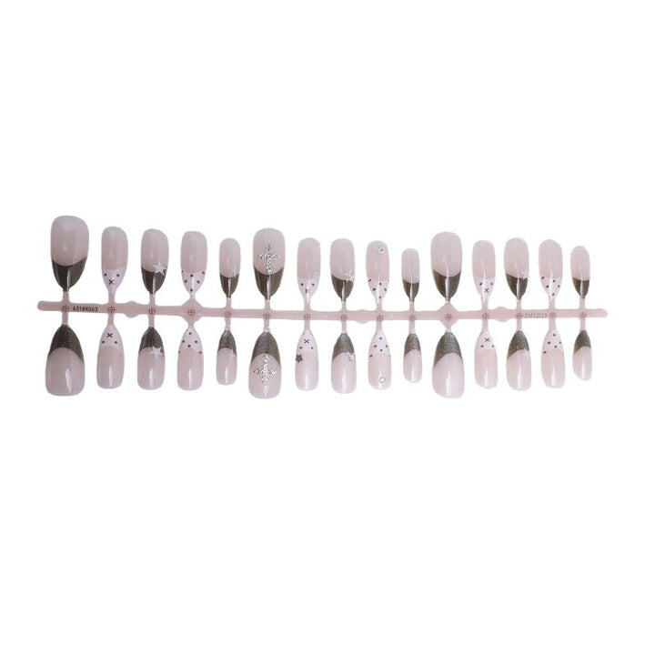 Glittering artificial nail design with elegant accents Stornfield