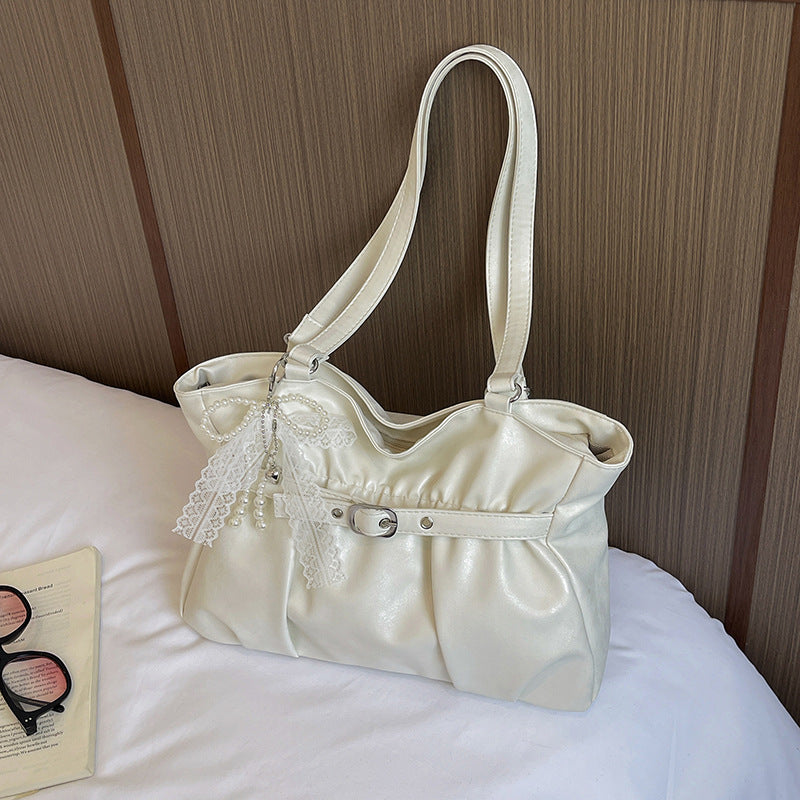 Elegant Leather Tote Bag with Decorative Accents