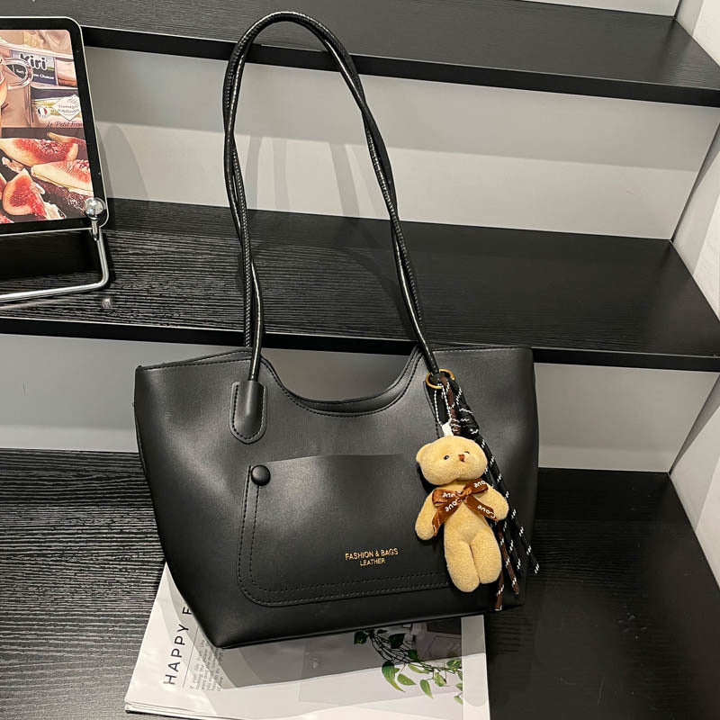 Elegant Tote Handbag with Plush Keychain