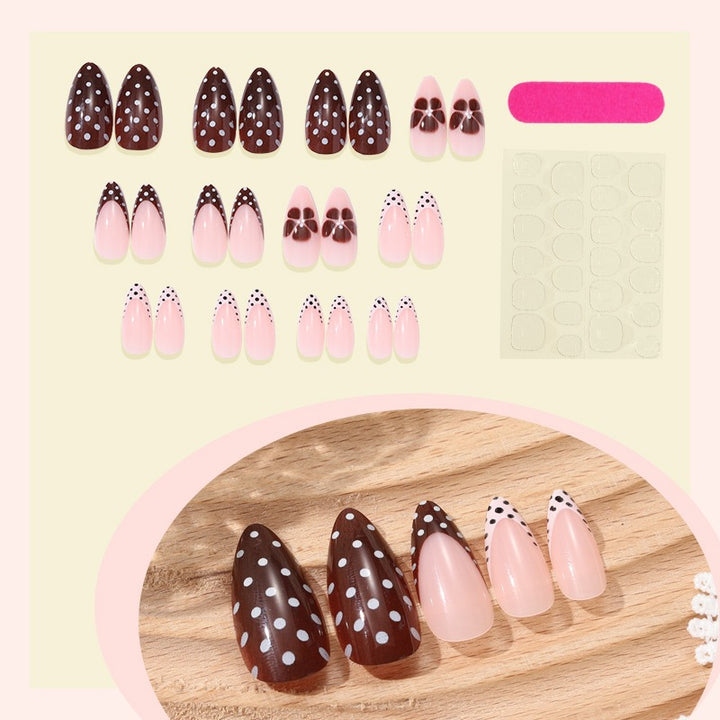 Nail set with elegant dot and flower design Stornfield