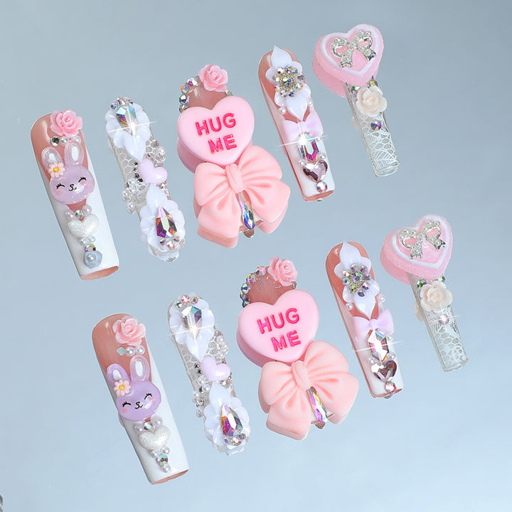 Creative nail art set with playful animal and heart motifs Stornfield