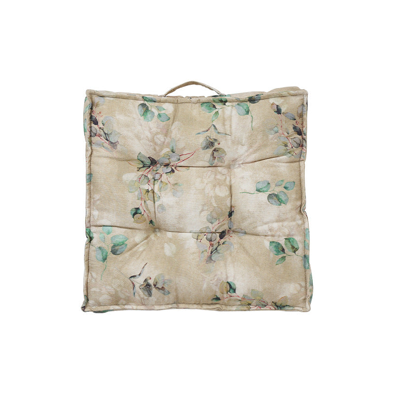 Padded seat cushion with tufting and bamboo motif