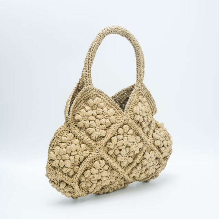 Handmade macrame shoulder bag with playful flower pattern Stornfield