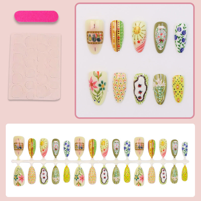Nail art set with elaborate floral and colorful design Stornfield
