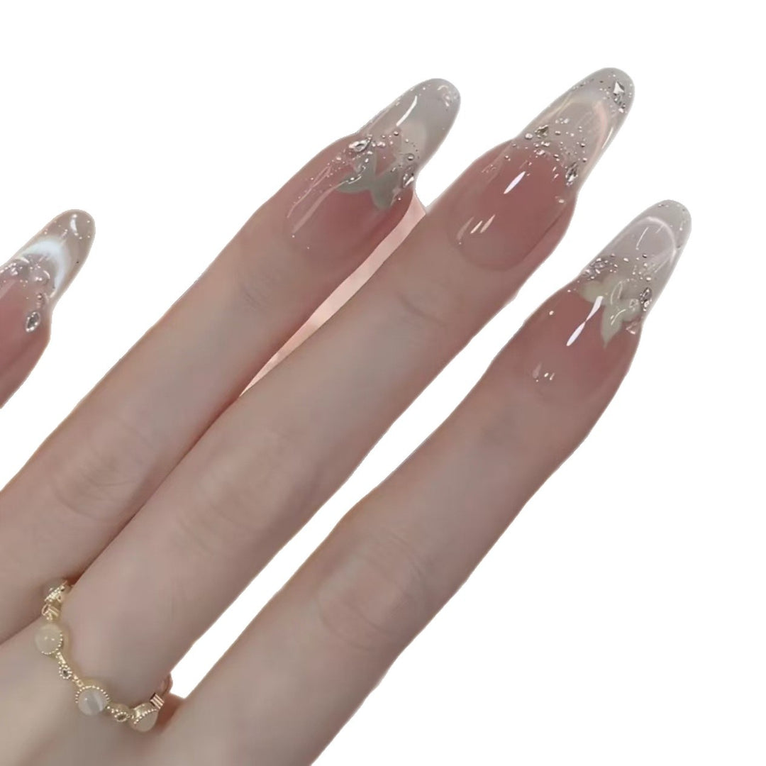 Elegant Acrylic Nail Extensions with Glitter Accents