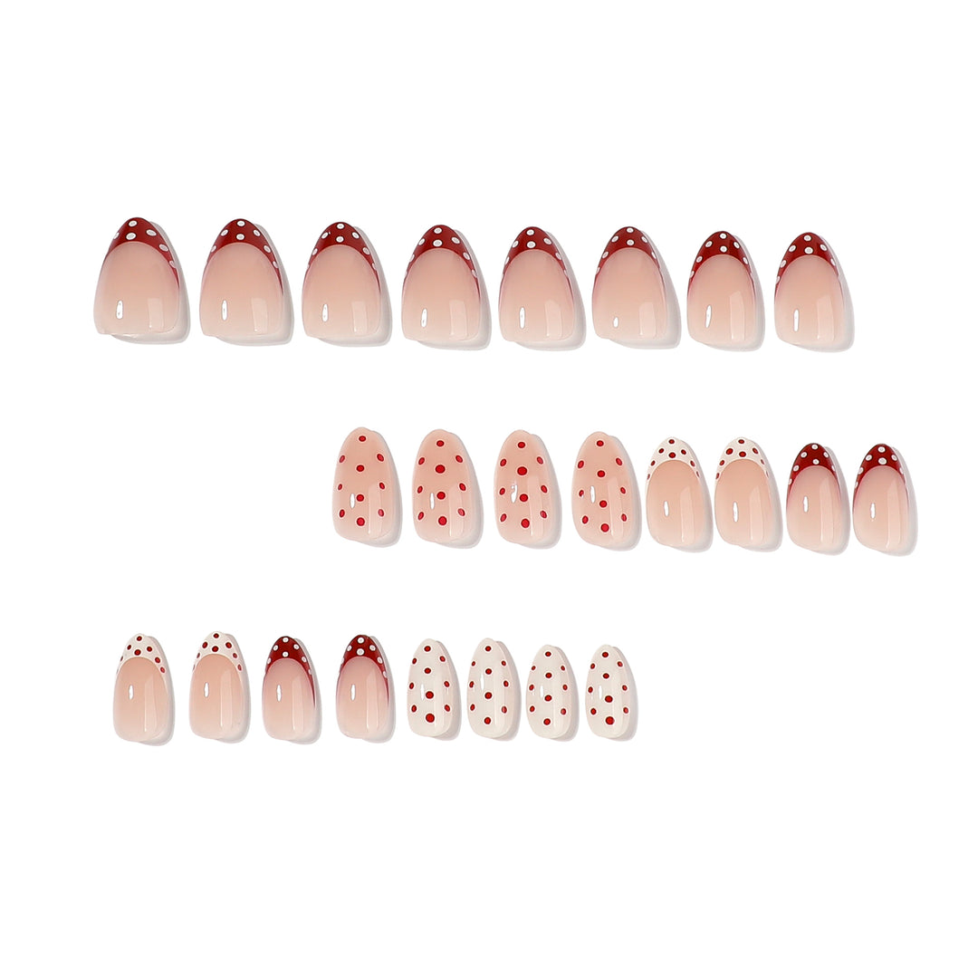 Artful stiletto nails with cute dots and accentuated color gradients Stornfield
