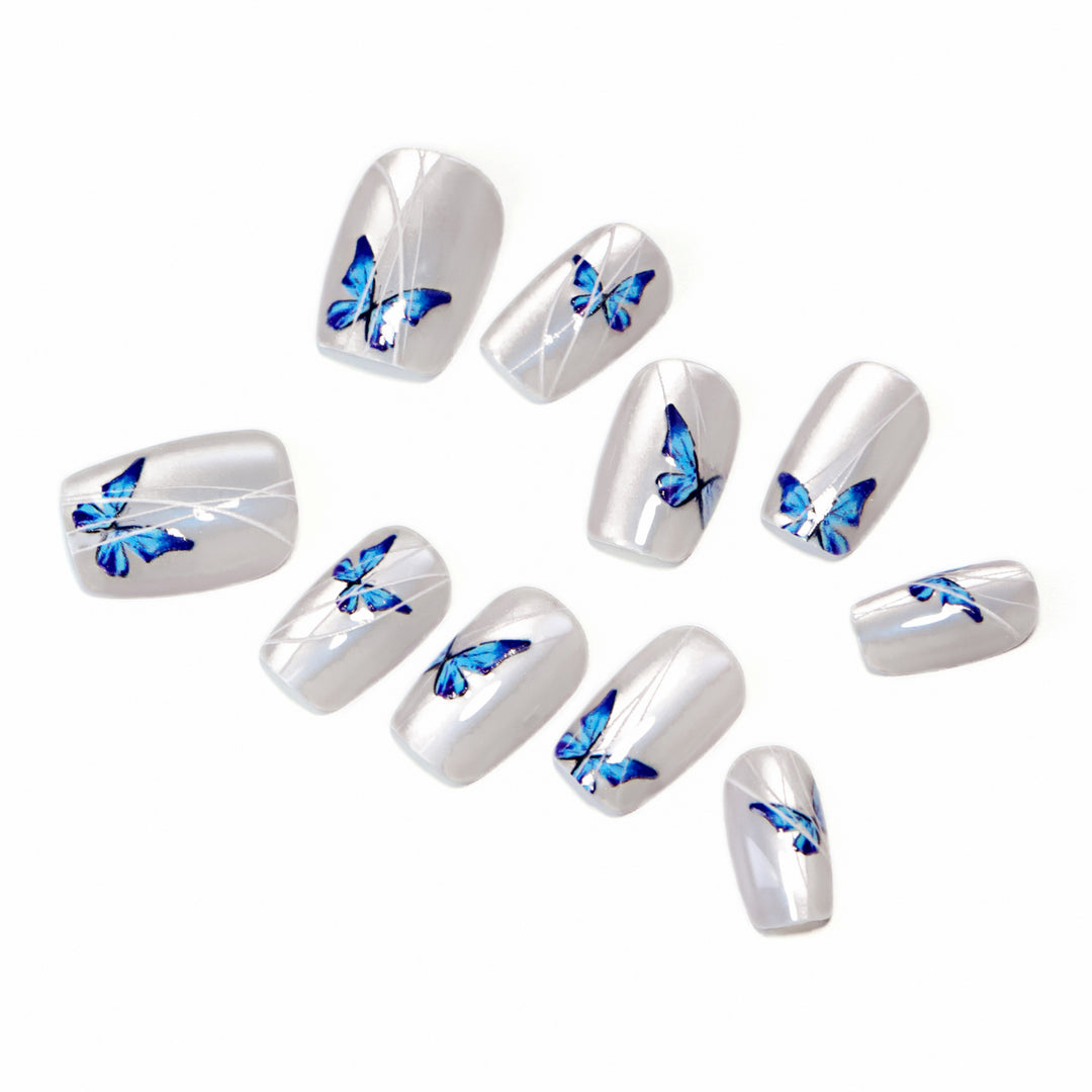 Creative nail extensions with intricate butterfly design Stornfield