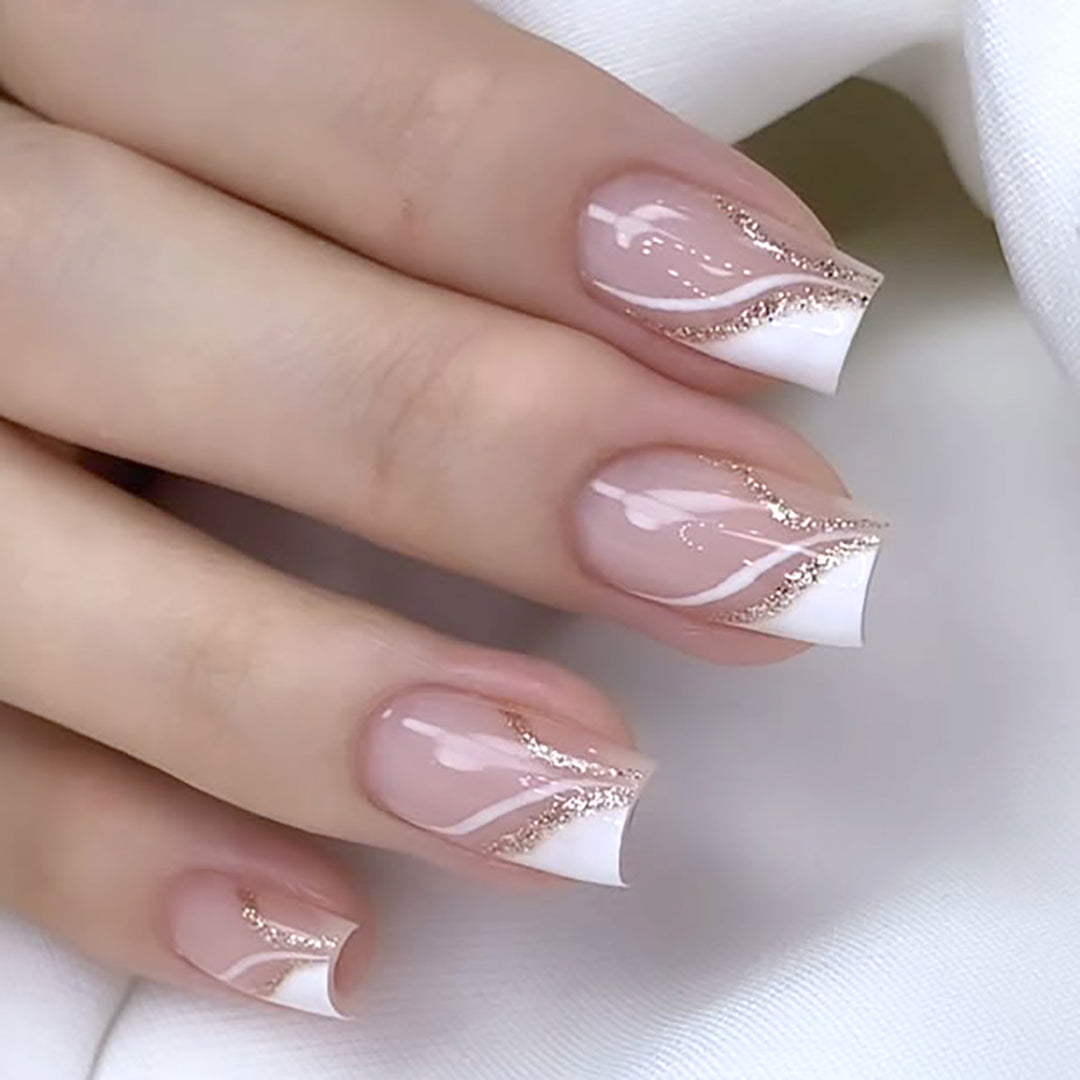 Elegant French Tip Press-On Nails with Glitter Accents Stornfield