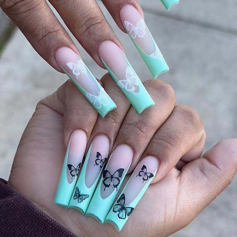 Artificial nail extensions with butterfly design Stornfield