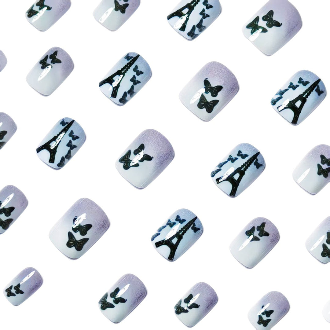 Artificial nails with Paris motif and butterflies Stornfield