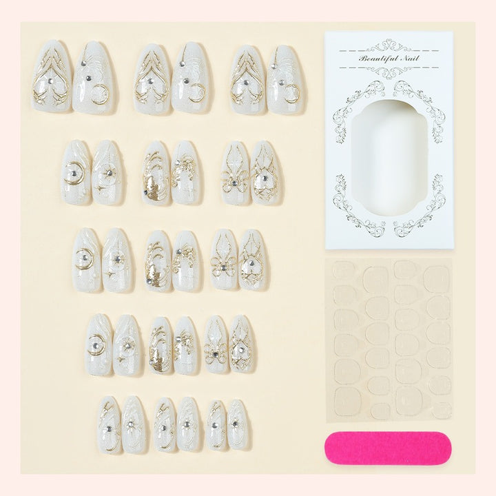 Acrylic nail set with elegant embellishments and glitter accents Stornfield