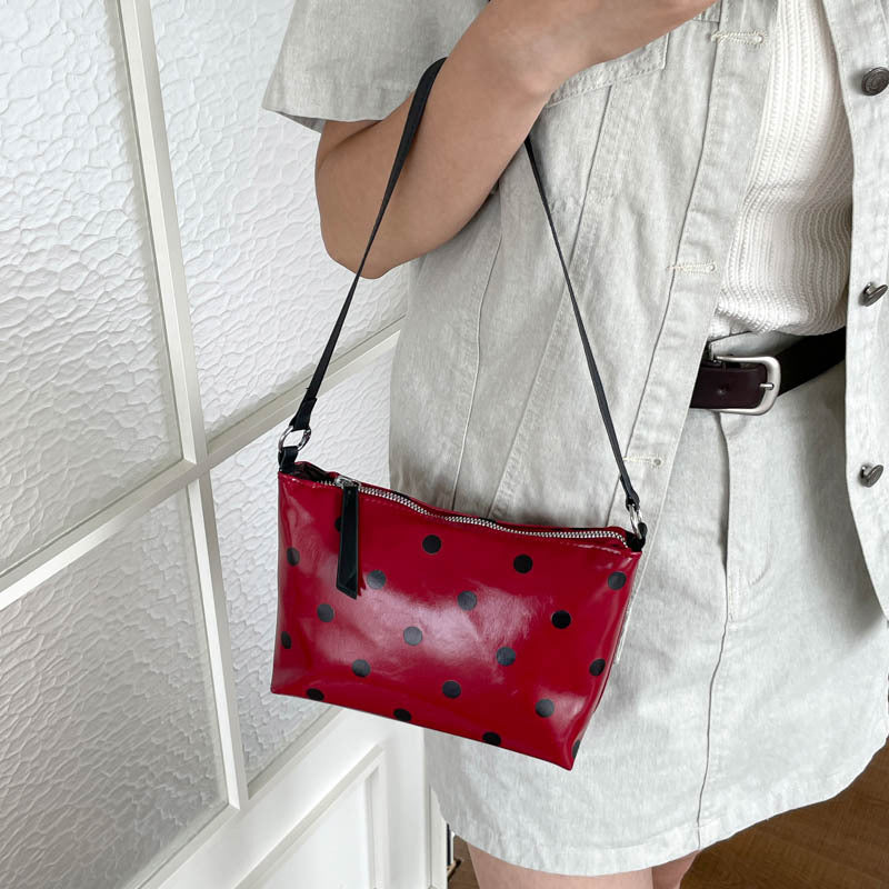 Sleek Polka Dot Handheld Clutch