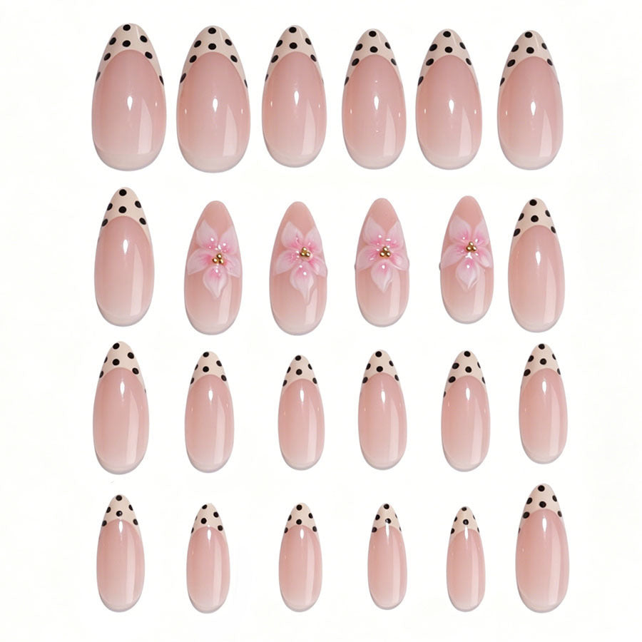 Acrylic nail set with floral accents and dots Stornfield
