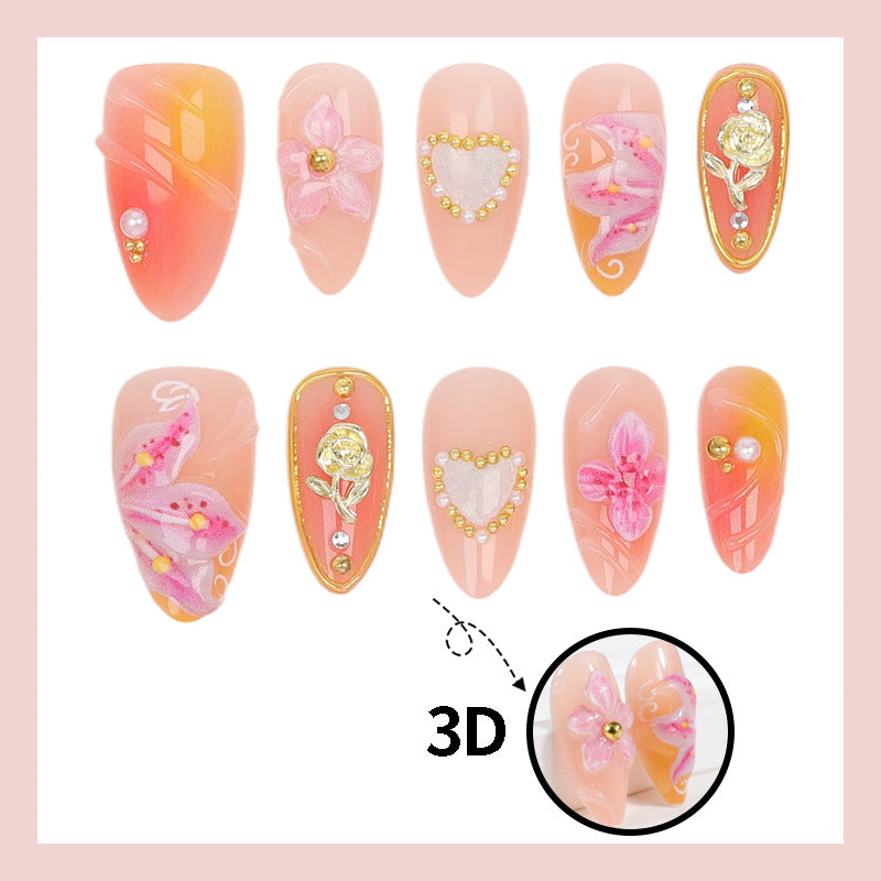 Artificial nail set with elegant floral decorations and glitter details Stornfield