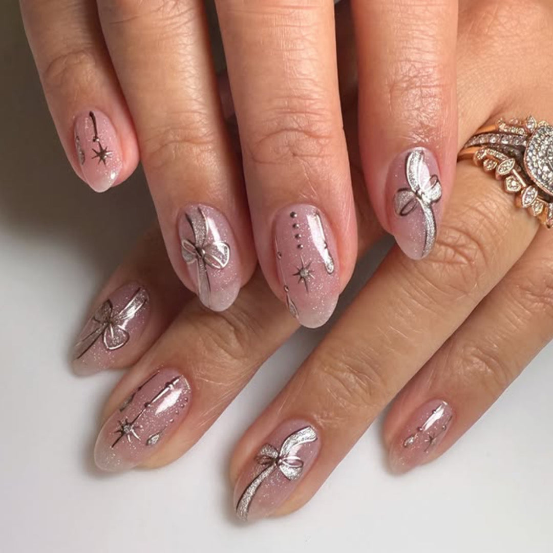 Artificial nail art with playful dots and bows Stornfield