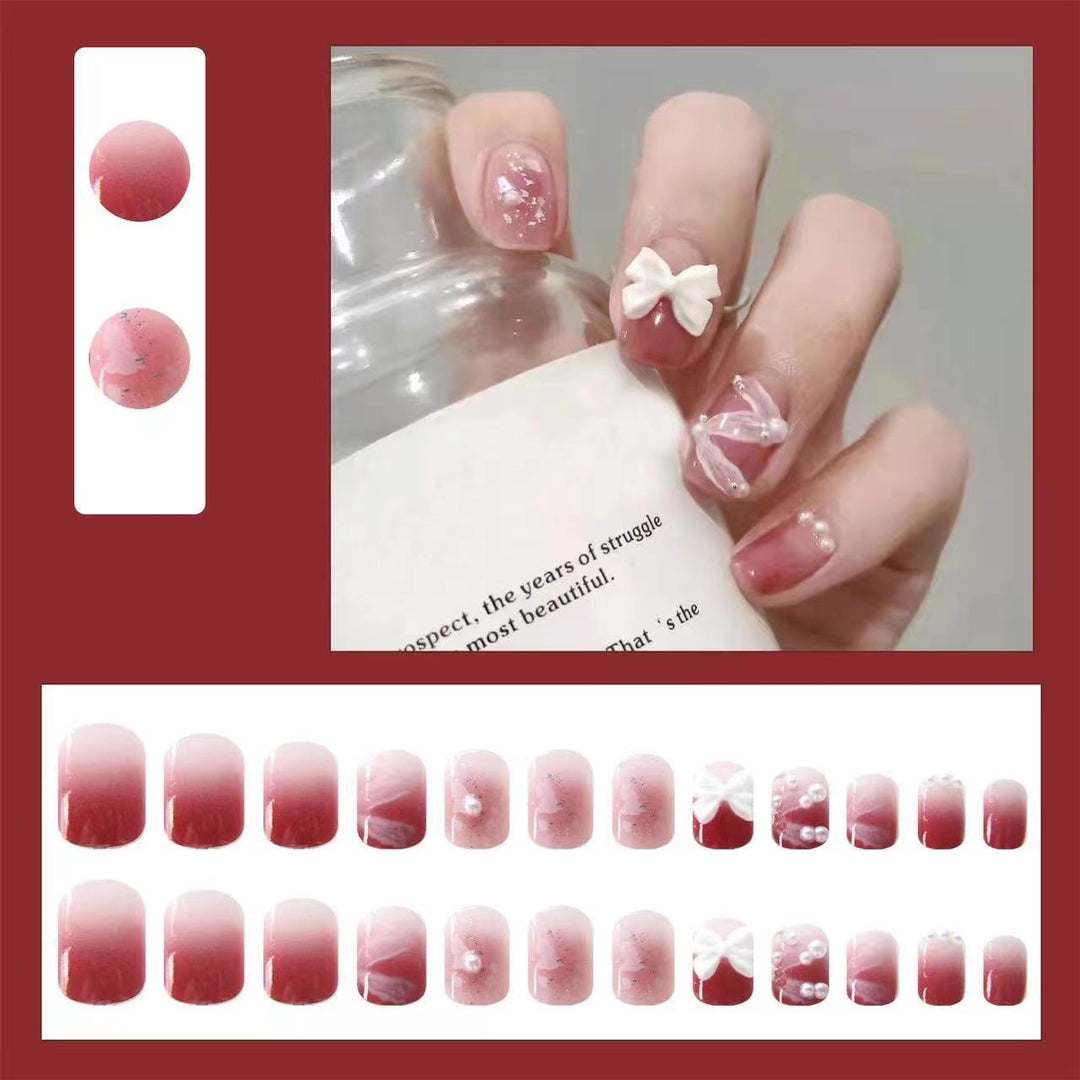 Creative art nails with bows and pearl coating Stornfield