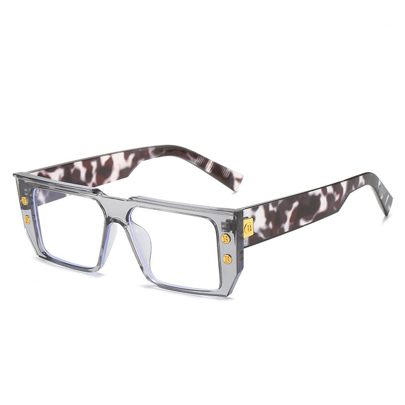 Women's fashionable clear glasses with golden accents Stornfield