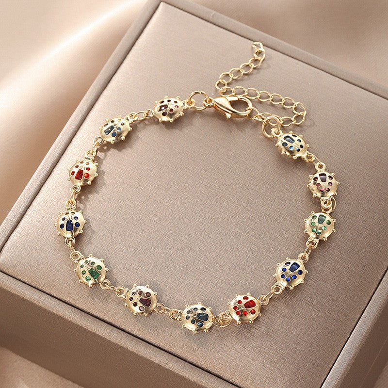Butterfly and Daisy Charm Anklet Stornfield