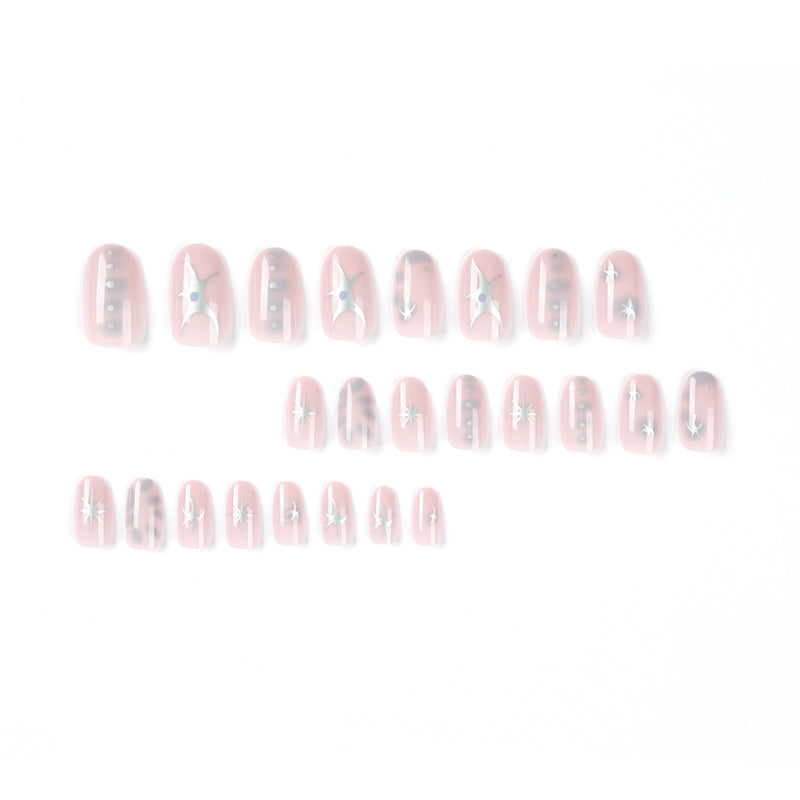 Elegant nail art with glamorous metal embellishments Stornfield