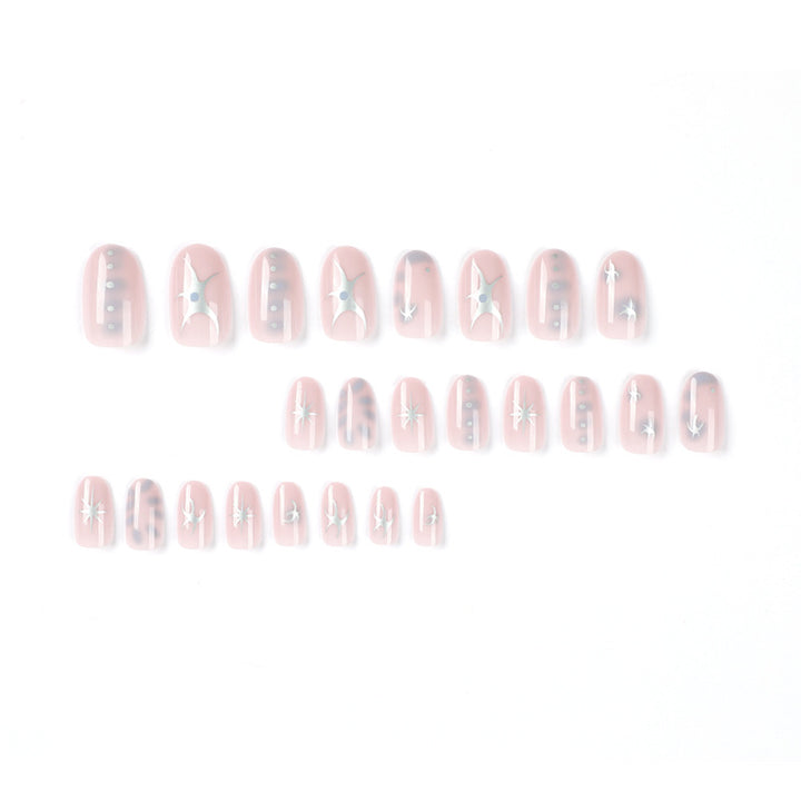 Elegant nail art with glamorous metal embellishments Stornfield