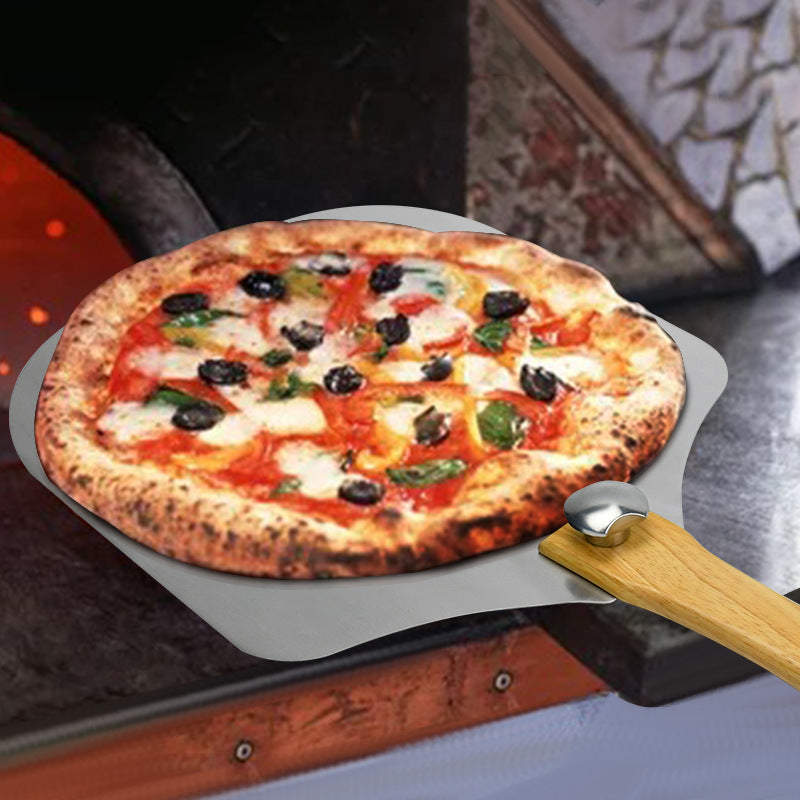 perforated stainless steel pizza peel with ergonomic wooden handle Stornfield