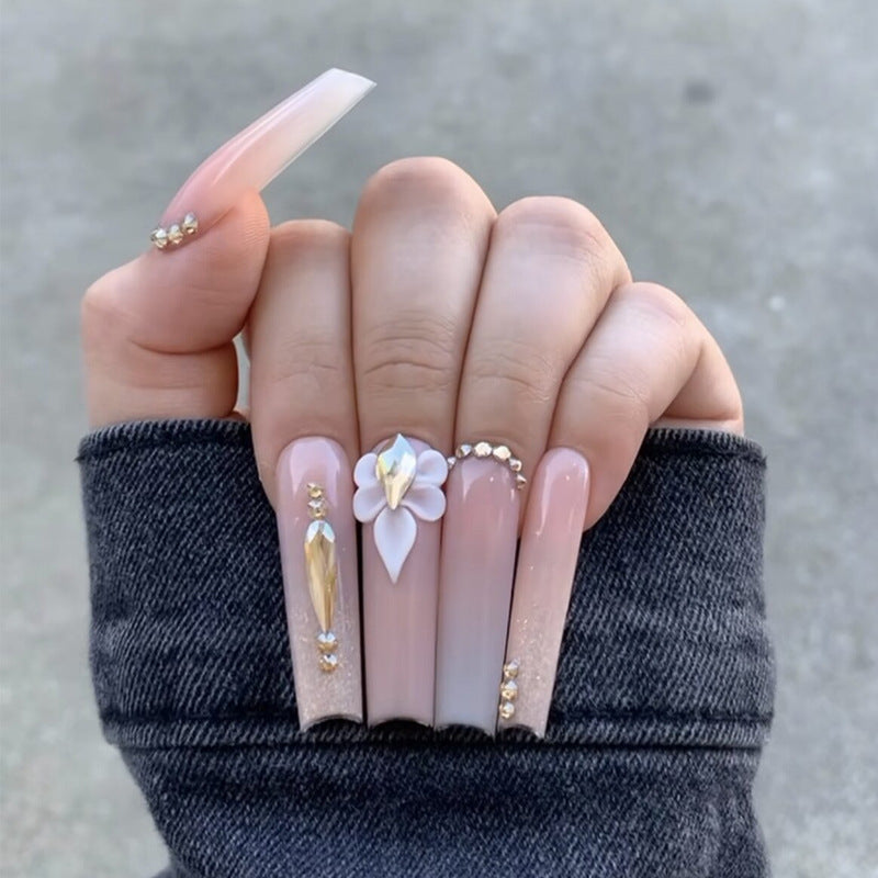 Decorative Long Stiletto Press-On Nails with Floral and Gemstone Accents Stornfield