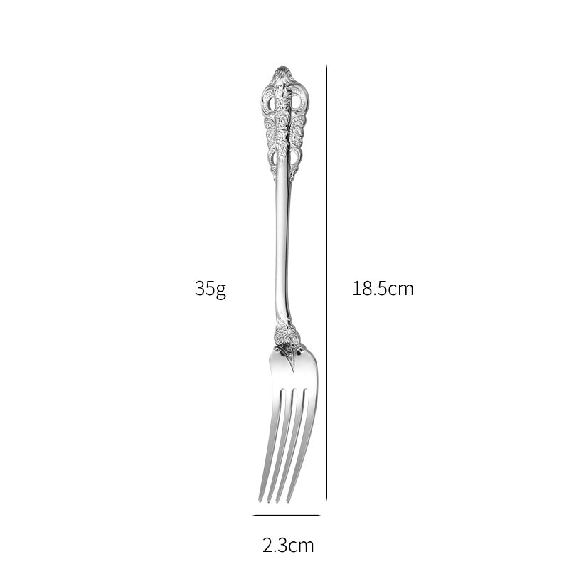 Elegant fish fork with artistic handle design Stornfield