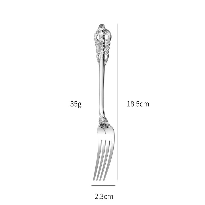 Elegant fish fork with artistic handle design Stornfield