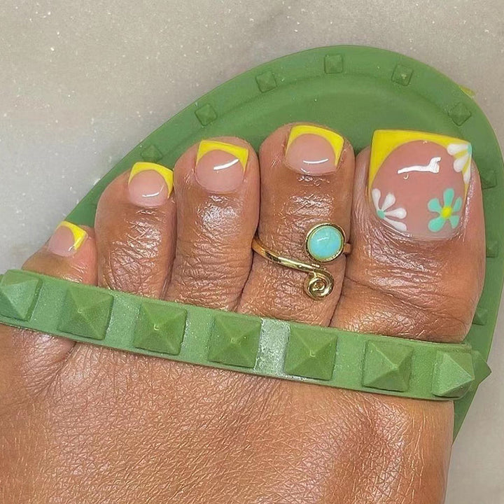 Creative toenail art with colorful flower accents Stornfield