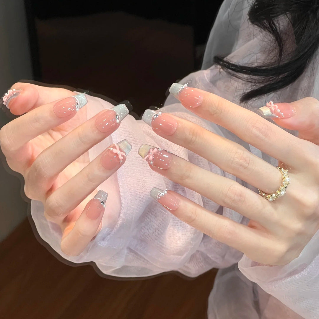 Elegant French Tip Nail Extensions with Floral Accents
