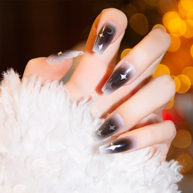 Elegant nail design with bow and rhinestone details Stornfield